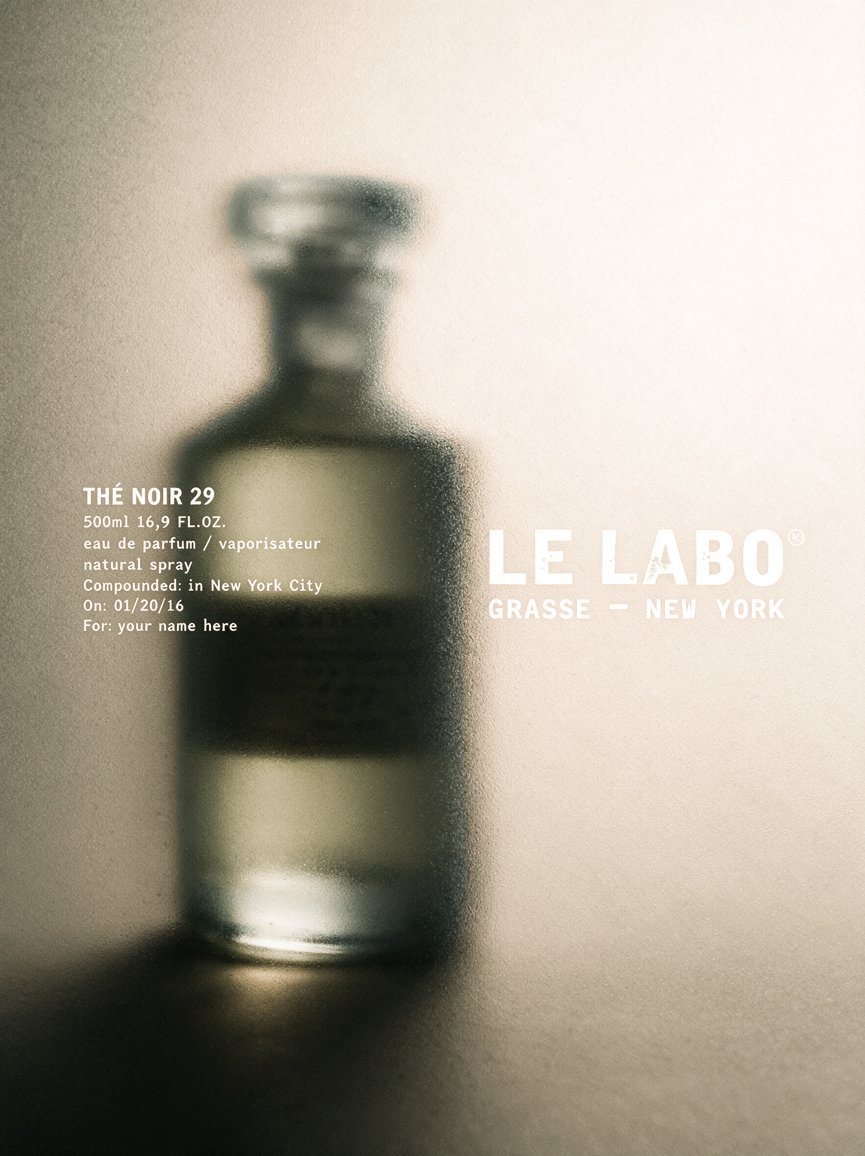 Bottle behind frosted glass with the label typeset beside it